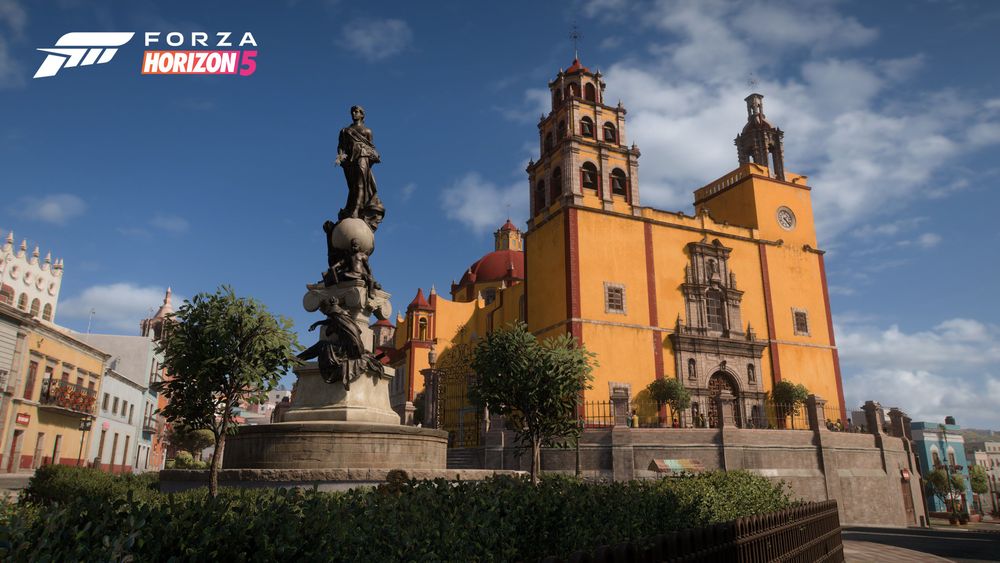 A historic building and orange architectural building in the city of Guanajuato. 